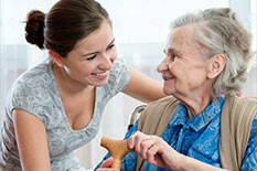 Picture of a woman caring for an elderly woman